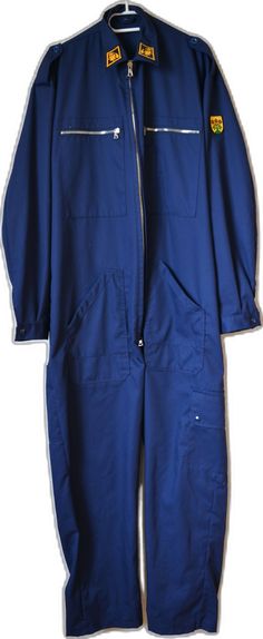 Navy Overalls With Pockets, Blue Long Sleeve Utility Overalls, Blue Utility Jumpsuits With Side Pockets, Blue Utility Jumpsuits And Rompers With Side Pockets, Blue Workwear Jumpsuits And Rompers With Side Pockets, Blue Workwear Jumpsuit With Side Pockets, Blue Jumpsuits And Rompers With Side Pockets For Work, Blue Overalls With Side Pockets For Work, Jumpsuit Vintage