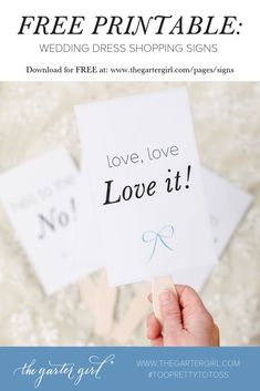 a person holding up a sign that says, free printable wedding dress shopping signs