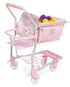 a pink baby stroller filled with lots of fruit