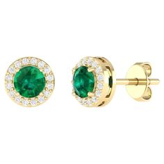 Indulge in the allure of understated luxury with our 18 Karat Yellow Gold 0.96 Carat Emerald Solitaire Stud Earrings—a testament to the artistry and refinement that defines our collection. Crafted with precision and passion, each piece is a unique manifestation of timeless elegance. The solitaire design is a celebration of simplicity and sophistication. The meticulously chosen yellow gold enhances the gem's natural beauty, providing a harmonious backdrop that elevates the overall aesthetic. Thes