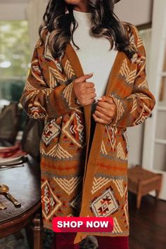 This Western Aztec Pattern Knit Cardigan is a stylish and cozy addition to your wardrobe. With its casual open front design and long sleeves, it's perfect for staying warm and fashionable in cooler weather. The Aztec pattern adds a touch of Southwestern flair, making it a versatile choice for both casual and semi-formal occasions. Fair Isle Sweater Coat For Fall, Cozy Fair Isle Cardigan For Fall, Cozy Fair Isle Pattern Cardigan For Fall, Brown Long Sleeve Cardigan For Cold Weather, Cozy Brown Acrylic Outerwear, Brown Knitted Acrylic Outerwear, Bohemian Knit V-neck Outerwear, Fall Long Sleeve Cardigan With Fair Isle Pattern, Fair Isle Pattern Sweater Coat For Fall