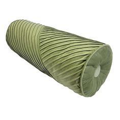 a roll of green fabric sitting on top of a white surface