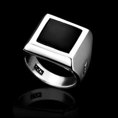 Sqauare signet ring-men's signet ring-men's onyx ring. Sterling silver classic square ring with 12*12 mm Onyx gem. Ring Weight: approx. 14 gr. Top diameter : approx. 17*17 mm Sizes Available: 57-69 EUR / 8-12.5 US Other sizes might be available by request:) More black onyx rings : www.etsy.com/shop/MrSmithJewelry?ref=hdr_shop_menu&search_query=onyx+ring More Oval rings : www.etsy.com/shop/MrSmithJewelry?ref=seller-platform-mcnav&search_query=Oval+Ring More rings :  www.etsy.com/shop/MrSmithJewelry?ref=hdr_shop_menu§ion_id=18467445 Back to my shop :  www.etsy.com/shop/MrSmithJewelry Handmade Made with style and UNCOMPROMISING QUALITY from the jewelry design studio of Mr Smith. All items are delivered in a special gift box. Upon purchase, please write me your phone number for delivery purpos Luxury Classic Sterling Silver Signet Ring, Luxury Handmade Sterling Silver Signet Ring, Luxury Men's Onyx Signet Ring, Luxury Silver Classic Signet Ring, Luxury Silver Signet Ring For Men, Luxury Men's Onyx Ring As A Gift, Luxury Black Rings For Men, Luxury Onyx Men's Ring As A Gift, Luxury Handmade Silver Signet Ring