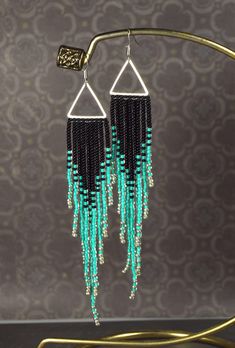 Long and stylish earrings. Made of Czech beads number 10 and 12. Mint and black color. If you like these earrings, but you want a different size or color - contact me. I will be glad to help you. Length - 4,72 inches (with ear hooks) Width - 0,59 inches Materials: Seeds beads Nylon Silver plated ear wire metal fittings All my jewelry is shipped from Ukraine by registered air mail with tracking numbers. I carefully pack and gift wrap all items. Purple Choker Necklace, Purple Choker, Octopus Crochet Pattern, Mint Earrings, Earrings Triangle, Beaded Earrings Diy, Beaded Jewlery, Beautiful Beadwork, Purple Necklace