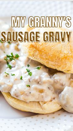 a sausage gravy sandwich on a white plate with the words, my granny's sausage gravy