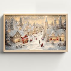 a christmas village scene with people walking through the snow