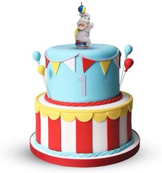 a blue and red circus cake with a clown on top