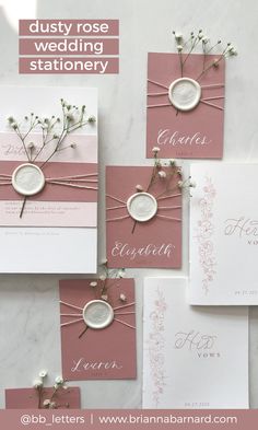 pink and white wedding stationery with flowers