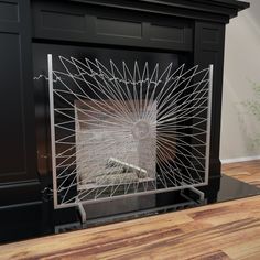 a fire place with an intricate design on it