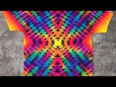 a colorful t - shirt with an abstract design on it