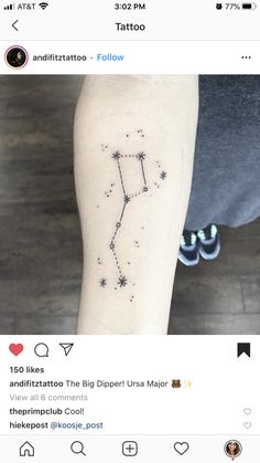 a person with a small tattoo on their arm that has the zodiac sign in it