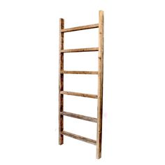 an old wooden ladder leaning against a white wall