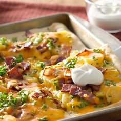 a pan filled with food on top of a table