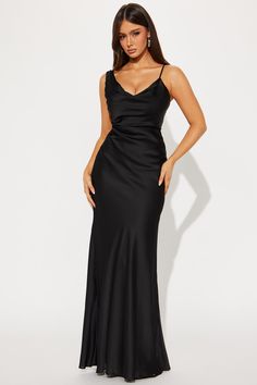 Available In Black. Satin Gown Sleeveless Cowl Neckline Adjustable Spaghetti Strap Hidden Back Zipper Lined Stretch Self: 100% Polyester Lining: 100% Polyester Imported | Adore Satin Gown Dress in Black size XS by Fashion Nova Black Spaghetti Strap Formal Gown, Black Formal Gown With Spaghetti Straps, Black Gown With Spaghetti Straps For Formal Occasion, Sleeveless Evening Slip Dress For Prom, Sleeveless Slip Dress For Prom Evening, Sleeveless Slip Dress For Prom, Sleeveless Bias Cut Gown For Bridesmaid, Black Maxi Dress With Spaghetti Straps And Bias Cut, Black Satin Sleeveless Gown