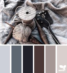 the color scheme is gray, brown and white with an assortment of knitting items on it