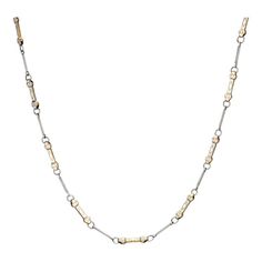 This is part of Chairish’s Costume Jewelry assortment.  Stylish and finely detailed vintage Art Deco era enamel fob chain (necklace) crafted in platinum (circa 1920s to 1930s).   The 15 inch choker length chain features double sided white enamel bar links. Originally a fob chain for a pocket watch, the chain is great worn today as a necklace. The fob can accommodate charms or a pendant if desired.      The necklace is in very good condition. We have not cleaned it in order to preserve the patina Antique Figaro Chain Necklace For Formal Occasions, Antique Figaro Chain Necklace, Antique Figaro Chain Link Necklace, Antique Necklaces With Rectangular Link Chain, Antique Figaro Link Chain Necklace, Formal White Gold Necklaces With Hook And Links, Formal White Gold Necklace With Hook And Links, Formal White Gold Necklaces, Vintage Formal Necklace With Rectangular Links