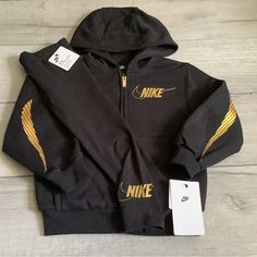 Zip Up Hoodie & Long Leggings Black With Gold Size 4 New With Tags Nike Cotton Sets For Winter, Nike Long Sleeve Sets For Winter, Nike Long Sleeve Winter Sets, Nike Sporty Winter Sets, Sporty Nike Winter Sets, Black Hooded Cotton Set, Black Hooded Sets For Fall, Nike Long Sleeve Sports Sets, Black Hooded Fall Sets