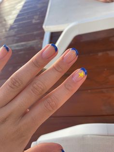 Blue french tip nails with gold / yellow star detail Nail Blue And Yellow, Blue And Yellow Nails Short, Blue And Yellow Star Nails, Yellow Star Nails, Nails Blue And Yellow, Yellow Blue Nails, Nail Inspo Yellow, Blue Yellow Nails, Yellow And Blue Nails