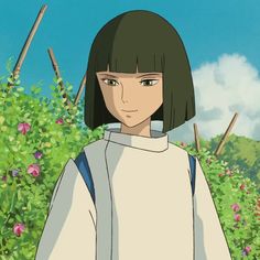 an anime character with black hair standing in front of some bushes and trees, looking at the camera