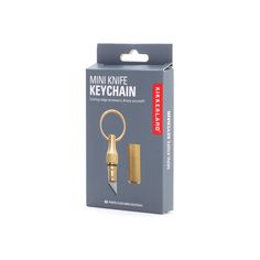 the mini knife keychain is gold in color and has a metal clip on it