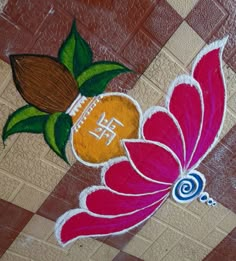 an artistic painting on the ground with flowers