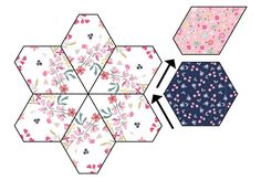 four hexagons with flowers and leaves on them are shown in the same pattern