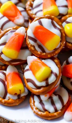 many candy candies are arranged on a white plate and ready to be eaten by the guests