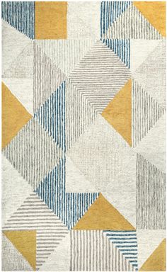 an area rug with different colors and shapes on the ground, including yellow, blue, grey