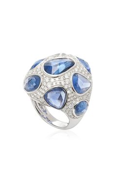 At the center of this statement ring are 15.19 carats of Fancy Shape Round-Cut Blue Sapphires. These sapphires, with their alluring deep blue hues, are meticulously arranged in a captivating pattern, forming the focal point of the ring. Surrounding the stunning blue sapphires are 2.43 carats of brilliant round natural white diamonds. 15.19CT Fancy Rose Cut Blue Sapphires 2.43CT Brilliant Round Natural White Diamonds 18KT White Gold Blue Sapphire Ring With Pave Setting For Formal Occasions, Blue Pear-shaped Sapphire Ring, Blue Sapphire Ring With Pave Diamond Setting, Blue Sapphire Diamond Ring With Pave Setting, Luxury Blue Pear-shaped Sapphire Ring, Luxury Blue Pear-shaped Ring, Blue Sapphire Ring, Blue Sapphire Rings, Vibrant Blue