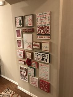 a wall with many different types of christmas cards on it