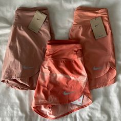 Price Includes All Three Pair Of Nike Shorts. All New With Tags, Size Xs. Pink Activewear With Pockets For Spring, Spring Pink Activewear With Pockets, Pink Activewear Shorts With Pockets, Nike Fitted Pink Shorts, Nike Pink Fitted Shorts, Pink Nike Fitted Shorts, Fitted Pink Nike Shorts, Pink Short Bottoms For Athleisure, Pink Sports Shorts With Pockets