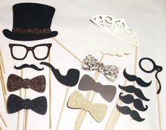 a group of photo props with mustaches and bow ties