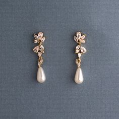 A single ivory teardrop pearl hangs from a delicate cluster of CZ jewels. These wedding day earrings are delightfully elegant. They are about 1.25 inches long and .25 inches wide, lead and nickel free, grade AAA CZ stones. Nose Piercing Gold, Aesthetic Silver Jewelry, Wedding Day Earrings, Jewelry Lookbook, Cz Earrings, Fancy Jewelry, Girly Jewelry, Dream Jewelry, Stylish Jewelry