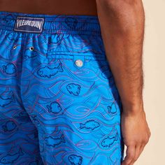 Embroidered men swim shorts, limited production, 99 pieces for the colors Storm blue, Neon blue, Navy blue and Palace blue, 199 pieces for the color red.Swimwear with elastic waistband with drawstring and silver tips (engraving 925 certified)Side pockets and back pocket with Turtle personnalized round snap buttonMen swim shorts with two back eyeletsSide leg length in M: 39.5 cm Enjoy a complimentary first repair of your swim shorts, if registered within 6 monthsFully lined with water-resistant m Blue Swim Trunks With Built-in Shorts, Beachwear Blue Short Swim Trunks, Blue Short Length Swim Trunks For Pool, Blue Fitted Swim Trunks For Summer, Blue Short Swimwear For Pool, Blue Swim Trunks With Built-in Shorts For Pool, Blue Fitted Shorts For Pool, Fitted Blue Shorts For Pool, Blue Tight-fitting Shorts For The Pool