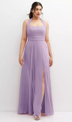 a woman in a long purple dress