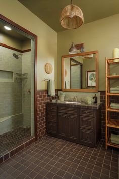 A soothing brown bathroom design with sage green walls and accents, offering a calming and natural atmosphere. Sage Green And Brown Bathroom, Green Bathroom Inspiration, Green Bathrooms Inspiration, Sage Green Bathroom, Green Bathroom