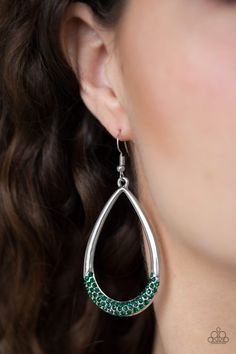 As if dipped in glitter, the bottom of a glistening teardrop rhinestone is encrusted in rows of glassy green rhinestones for a refined flair. Earring attaches to a standard fishhook fitting.

Sold as one pair of earrings. Emerald Green Stone, Fish Hook Earrings, Paparazzi Accessories, Green Earrings, Green Item, Paparazzi Jewelry, Pink Rhinestones, Love Is Free, Rhinestone Earrings