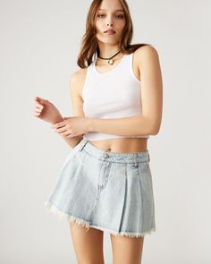 Experience the perfect combination of comfort and style with the MARLOWE skort. Made from high-quality denim, this pleated light wash mini skort features a raw edge hem for a unique touch. Perfect for any occasion, dress it up or down for a versatile and modern look. Pleated mini skort Hidden shorts underneath skirt Length: 13" 100% cotton Care instructions: hand wash cold separately, do not bleach, lay flat to dry, low iron if necessary, or dry clean Nikole is 5ft 10in and is wearing a size 27 Denim Skort, Steve Madden Store, Apparel Merchandising, Denim Cotton, Low Iron, Denim Fabric, Raw Edge, Cotton Weaving, Skirt Length