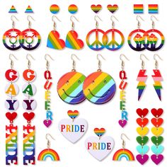 the pride earrings are all different colors and shapes, including hearts, rainbows, letters, and symbols