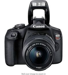 the canon eos - 1 digital slr is shown with its flash light on