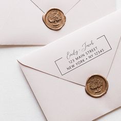 two envelopes with wax stamp on them