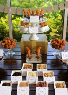 an assortment of desserts and snacks on a table