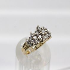 ⚓14K Yellow Gold Natural Diamond Cluster Cocktail  Ring (size 5.75) 14k Gold, acid tested. Not filled or plated.  In excellent condition! We sell the highest quality vintage and pre-owned items. Free domestic shipping always! On its way to you in 1 business day.  30 day return policy!  ⚓The Details Size 5.75 23 natural round diamonds approximate total ct wt 1.80 clarity SI-Si2   color G-H 11.69 mm on top 3.59 mm band 7.3 grams ⚓Who We Are  We are a small, family-owned business in Plymouth, MA. Located in the heart of Main Street, Main Street Jewelry Co.'s mission is to find one-of-a-kind, unique pieces. Vintage, antiques, and rare finds are our specialty, of course other than our brand new Italian silver chains with a price that can't be beat. We thank you for supporting small businesses e Street Jewelry, Silver Chains, Small Family, Diamond Cluster, Cocktail Ring, Main Street, Cocktail Rings, Rings Statement, Small Businesses