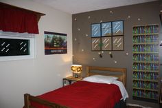 a bed room with a neatly made bed and pictures on the wall