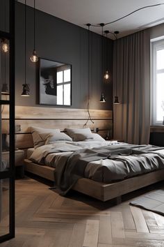 a large bed sitting next to a window in a room with wooden floors and gray walls