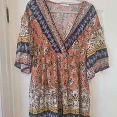 Nwot Ces Femme Boho Print Short Dress - Navy, Gold, Orange, Cream, Brown - 100% Rayon - Size Medium - Faux Wrap With Elastic Waist & Flowy Sleeves Patterned Flowy V-neck Mini Dress, Patterned Flowy V-neck Boho Dress, Flowy Patterned Boho Dress With V-neck, Flowy Patterned V-neck Boho Dress, Patterned V-neck Mini Dress, Patterned Floral Print V-neck Boho Dress, Fall V-neck Mini Dress With Boho Print, Patterned V-neck Mini Dress With Boho Print, Multicolor Boho Print V-neck Mini Dress