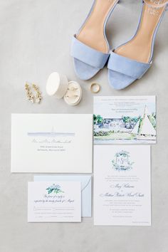 wedding stationery with blue shoes and rings