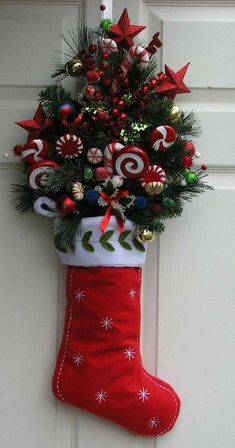 a christmas stocking hanging on the front door