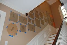 there are many blue arrows on the wall in this house that is decorated with cardboard