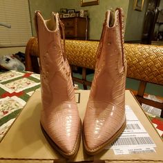 Sam Edelman Boots With 4 1/4 Inch Heels. Bnwt(Price Sticker) Never Worn. Color Pink With Silver Studs & A Croc Type Pattern On The Outside Of Boots. Size 10m . Top Of Boot To Bottom Down Back Is 8 3/4 Inches, From Heel To Toe 10 1/2 Inches. From Top Of Boot In Front To Tip Of Toe Is 9 1/2 Inches. No Shoe Box. Pink Ankle-high Western Boots, Pink Western Ankle-high Boots, Western Style Medium Width Heels With Pointed Toe, Pink Heeled Boots With Reinforced Heel And Pointed Toe, Pink High Heel Boots Medium Width, Western Style High Heel Pink Boots, Pink High Heel Western Boots, Pink Western Boots With Pointed Toe, Pink Western Boots With Almond Toe